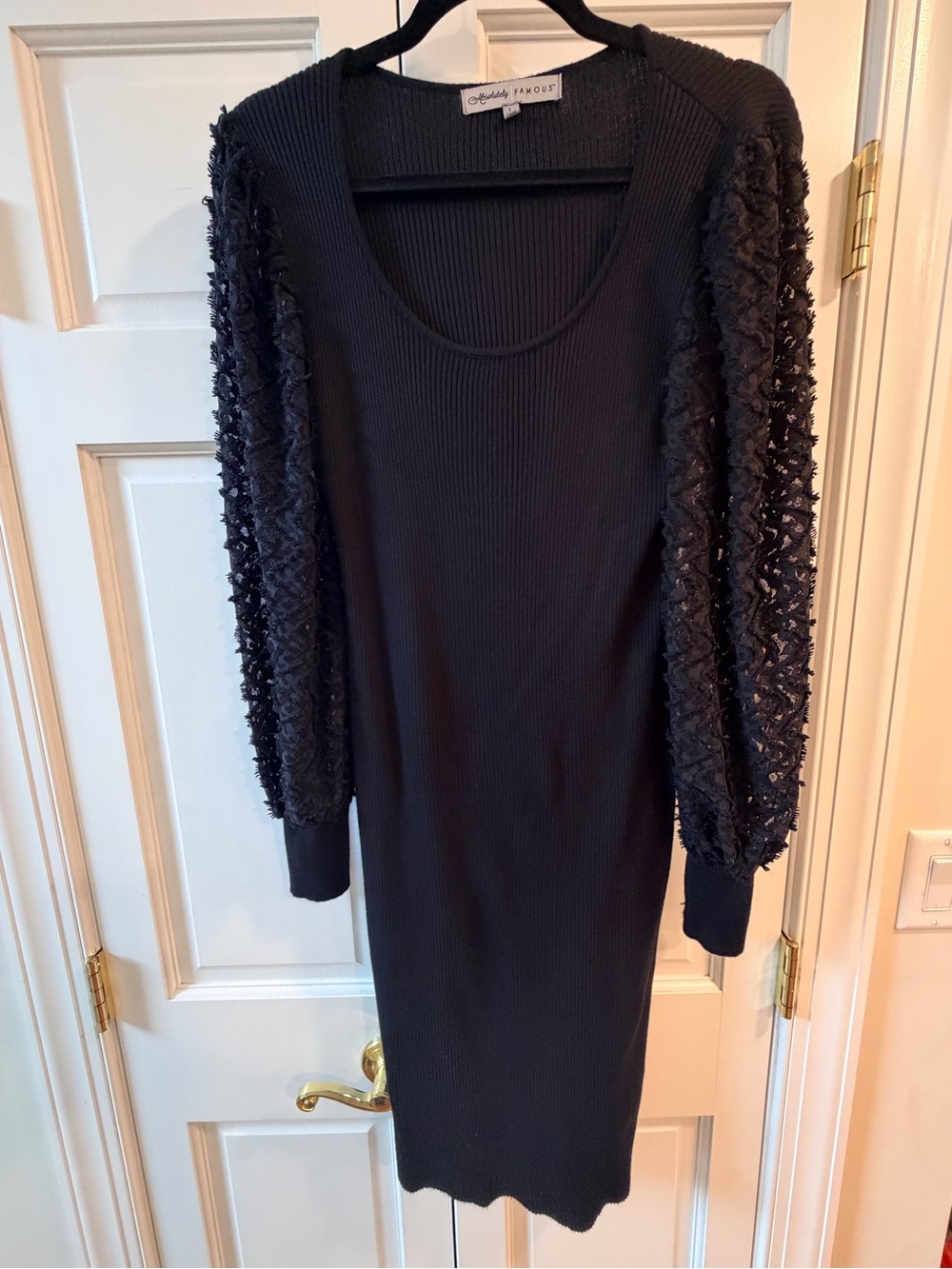 Absolutely Famous Black Ribbed Sheath Dress with Textured Puff Sleeves